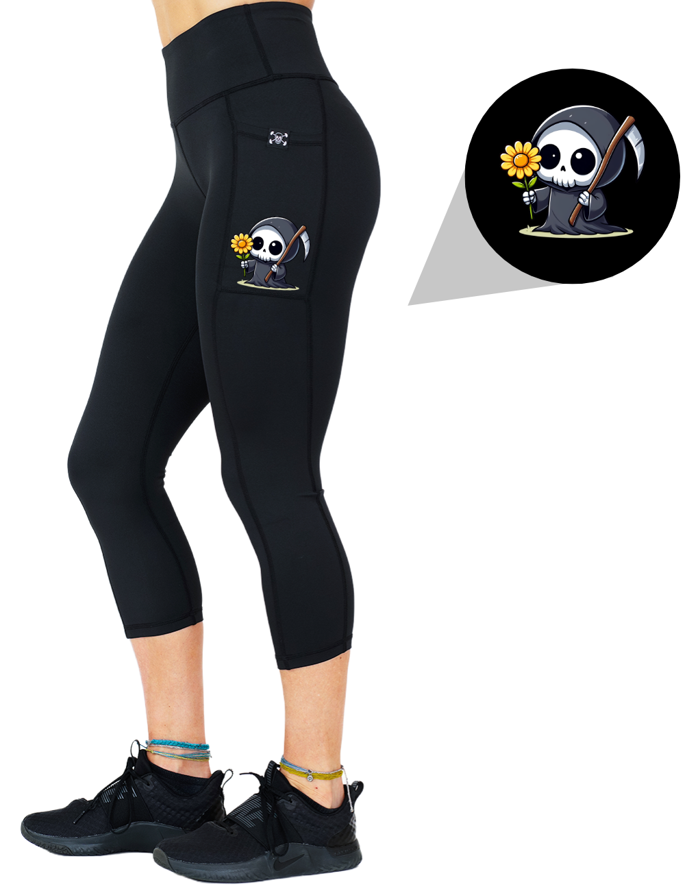model wearing the grim reaper graphic capri solid black leggings against a white background