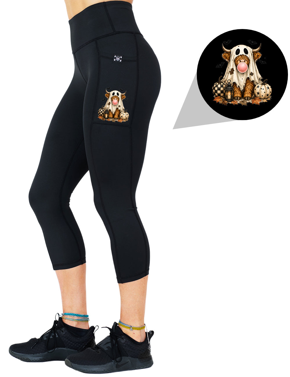 front of the spooky ghost cow graphic capri leggings