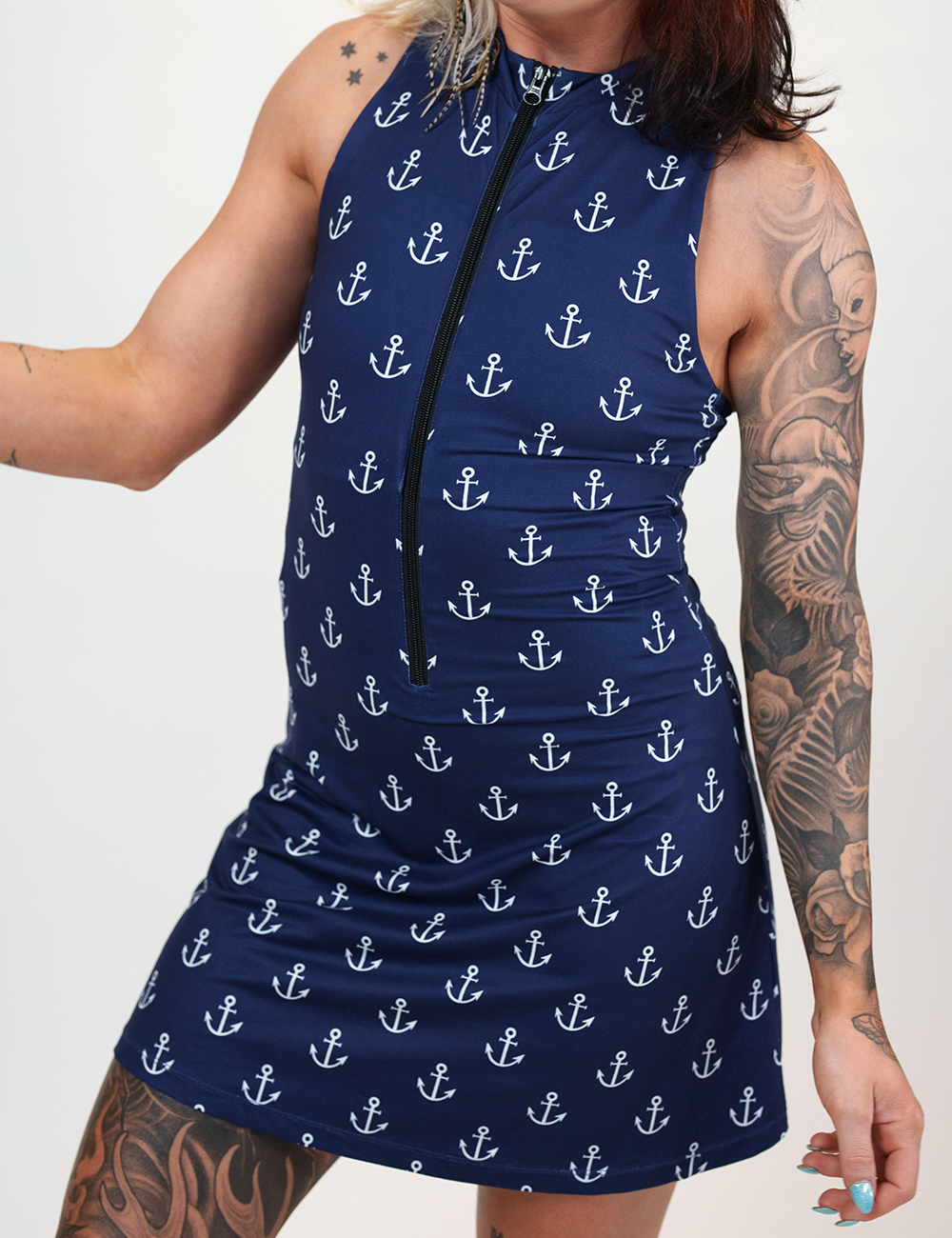 blue dress with white anchors pattern against a white background