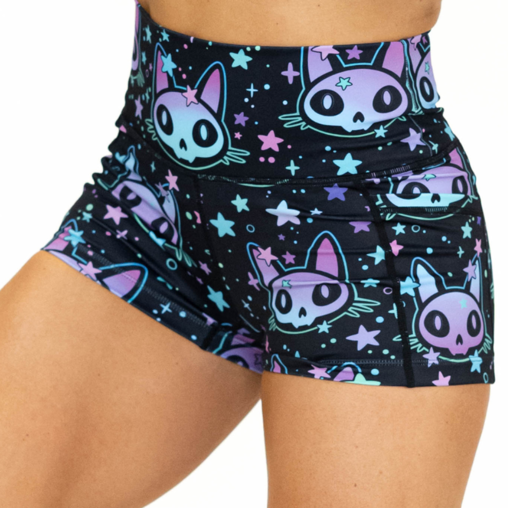 close up of 2.5 inch alien cat with stars shorts against a white background