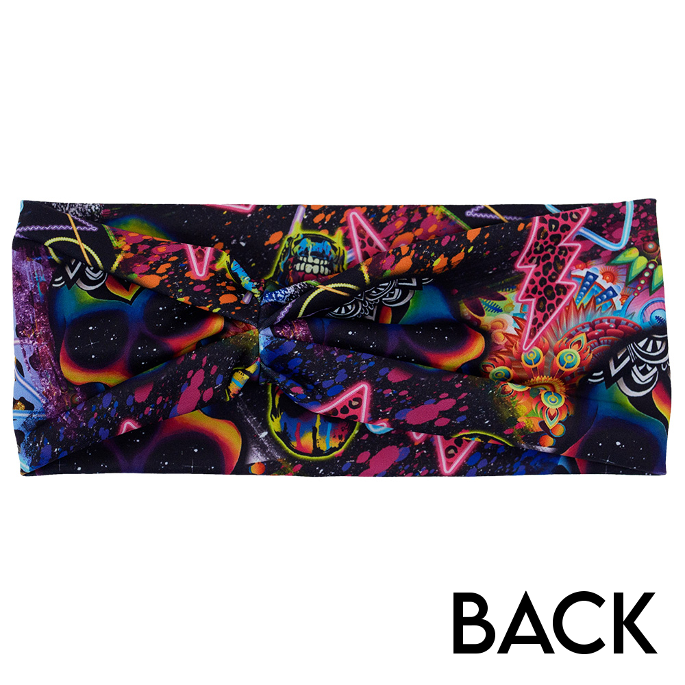 back of the brightly colored psychedelic skulls pattern against a busy background full of designs headband