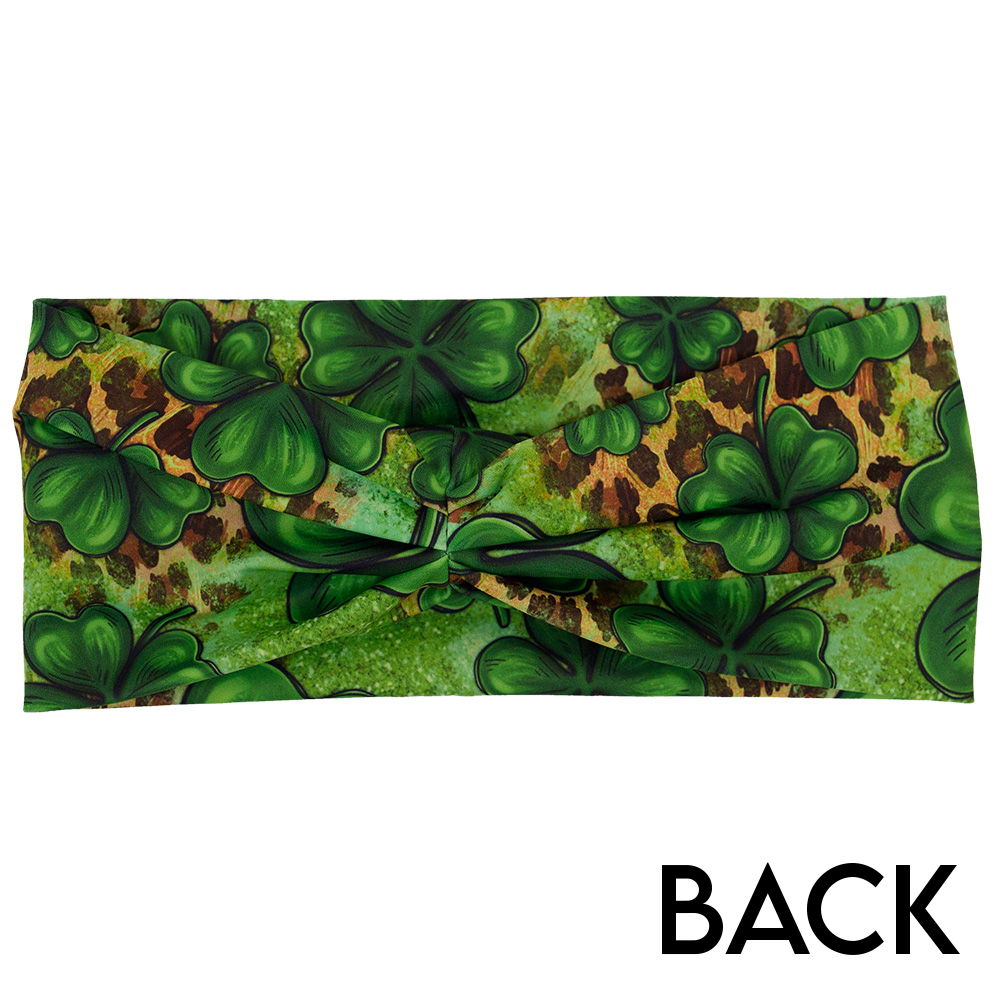 back of the clover pattern against a cheetah print and green background headband against a white background