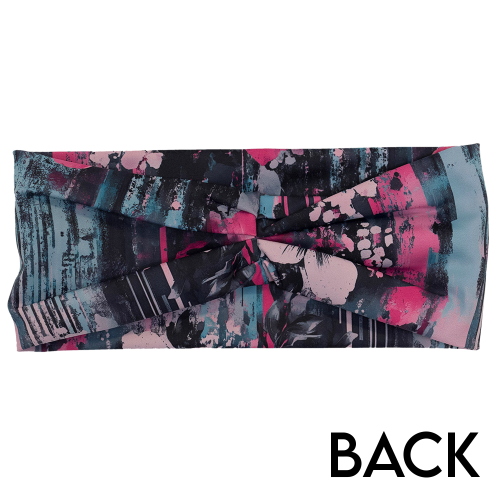 back of the pink flowers against a bold teal and pink striped background pattern headband against a white background