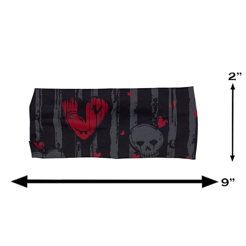 measuring tool for the red heart and gray skulls against a black and grey striped background headband, 2 inches tall and 9 inches wide