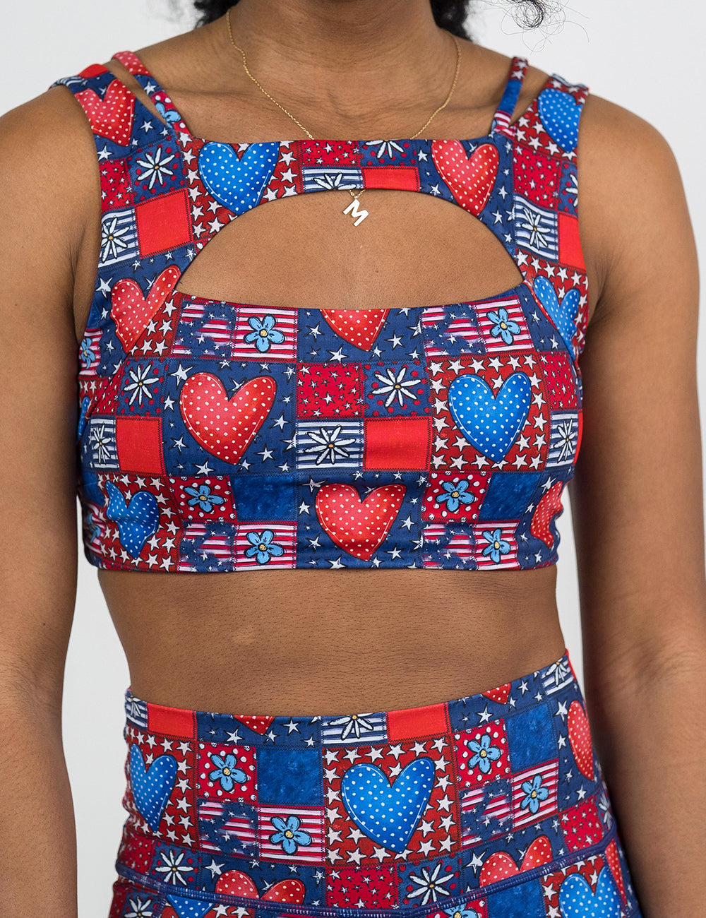 front of the patchwork american flags with red and blue hearts pattern vista bra against a white background