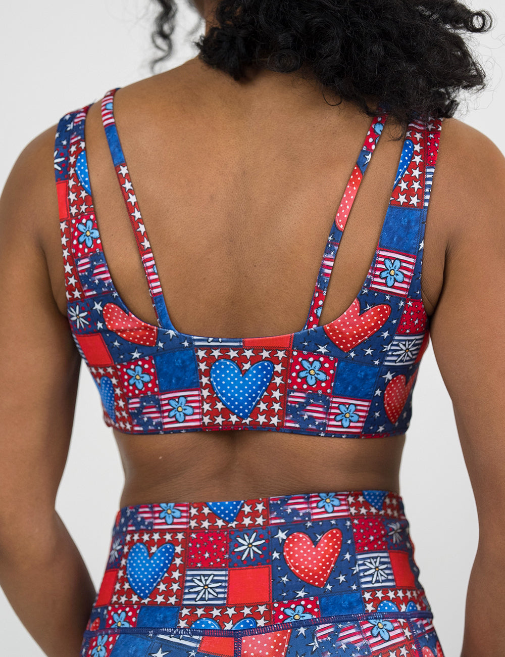 back of the red and blue hearts patchwork vista bra against a white background