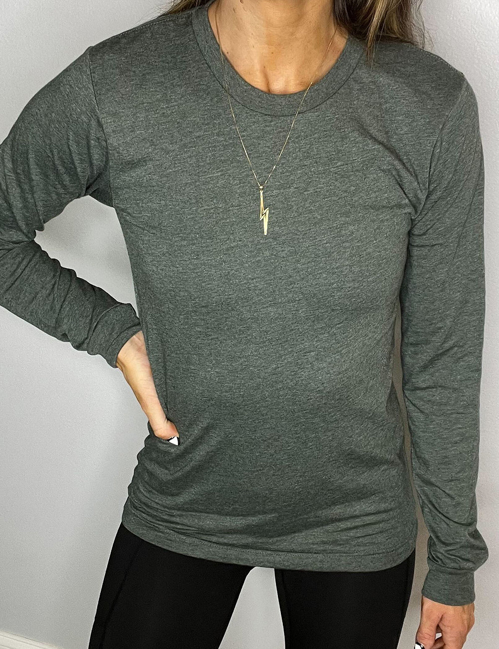 model wearing heather forest long sleeve shirt