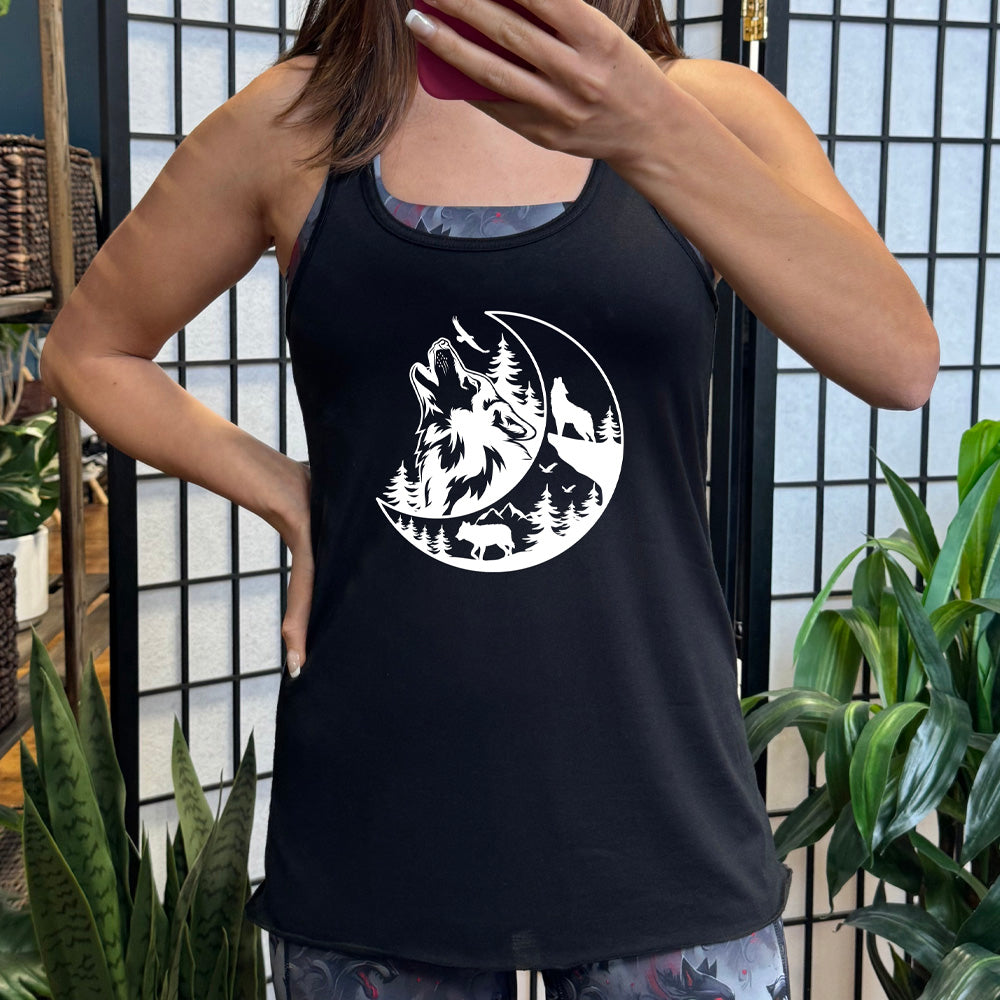 Black colored flowy tank with a wolf howling at the moon in the forest graphic on it