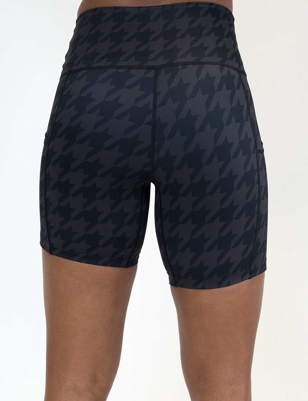 back of the 5 inch dark houndstooth pattern shorts against a white background