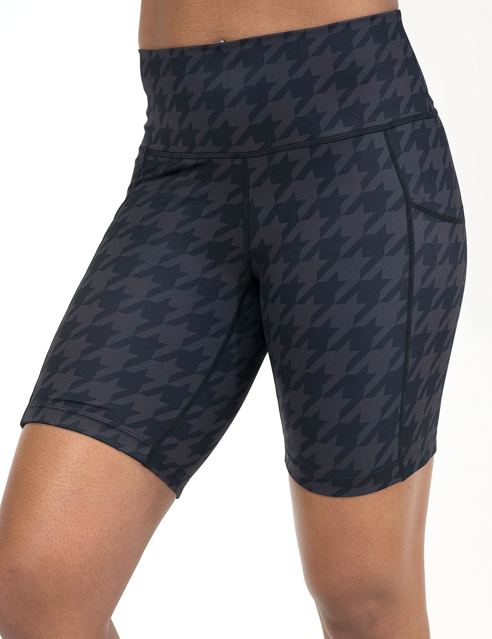 front of the 7 inch dark houndstooth pattern shorts against a white background