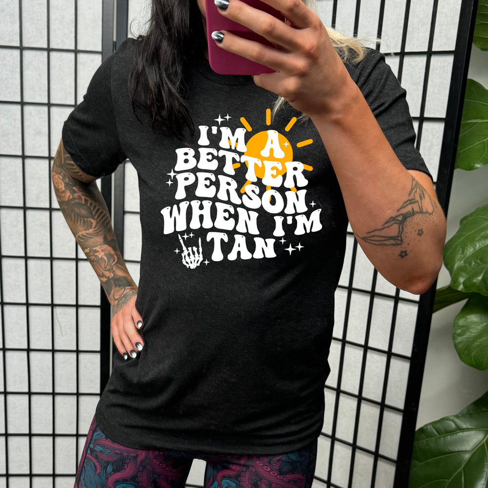 model wearing the I'm A Better Person When I'm Tan Unisex Shirt