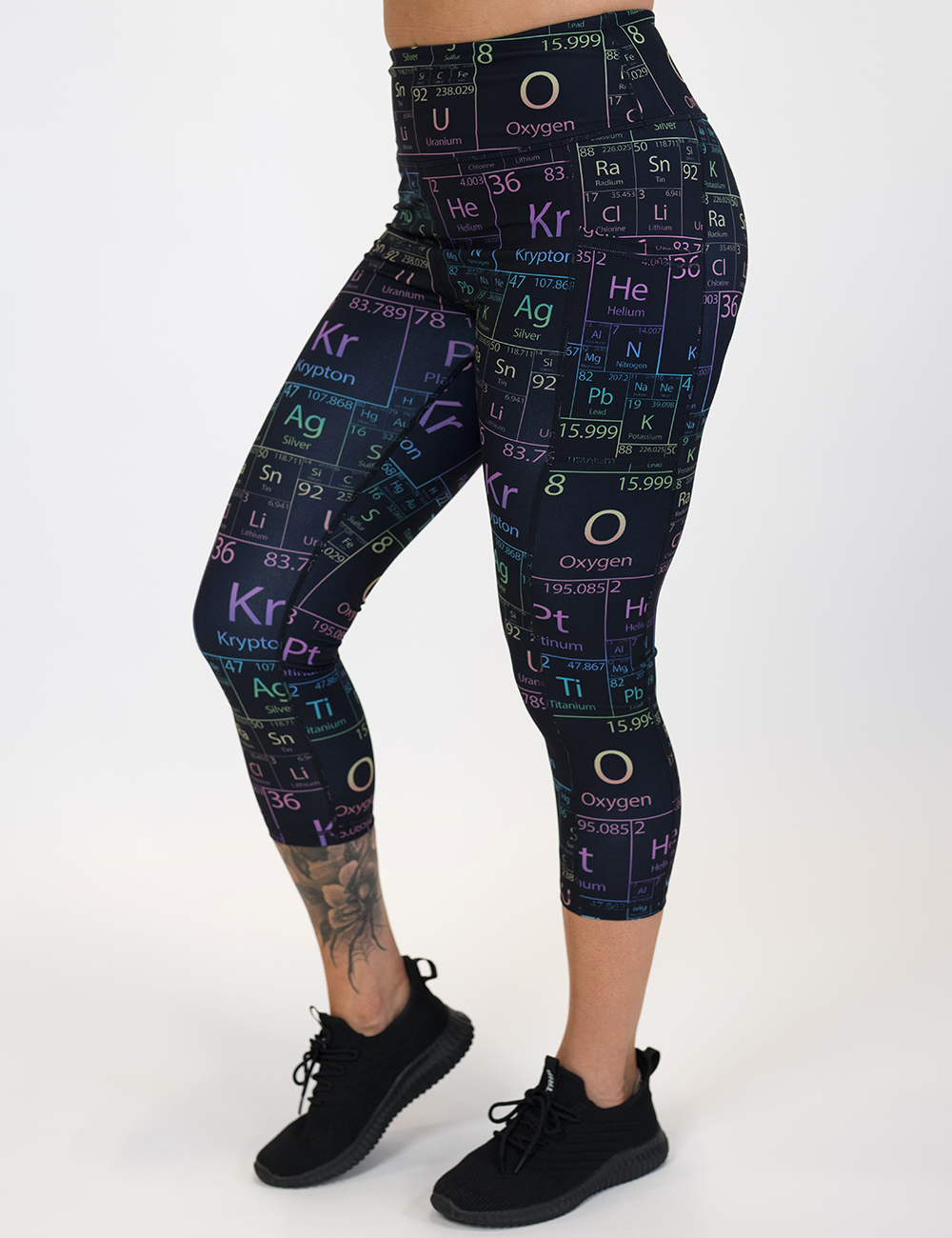 model wearing the capri length periodic table print leggings against a white background