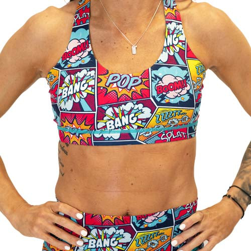 front view of comic book inspired print sports bra