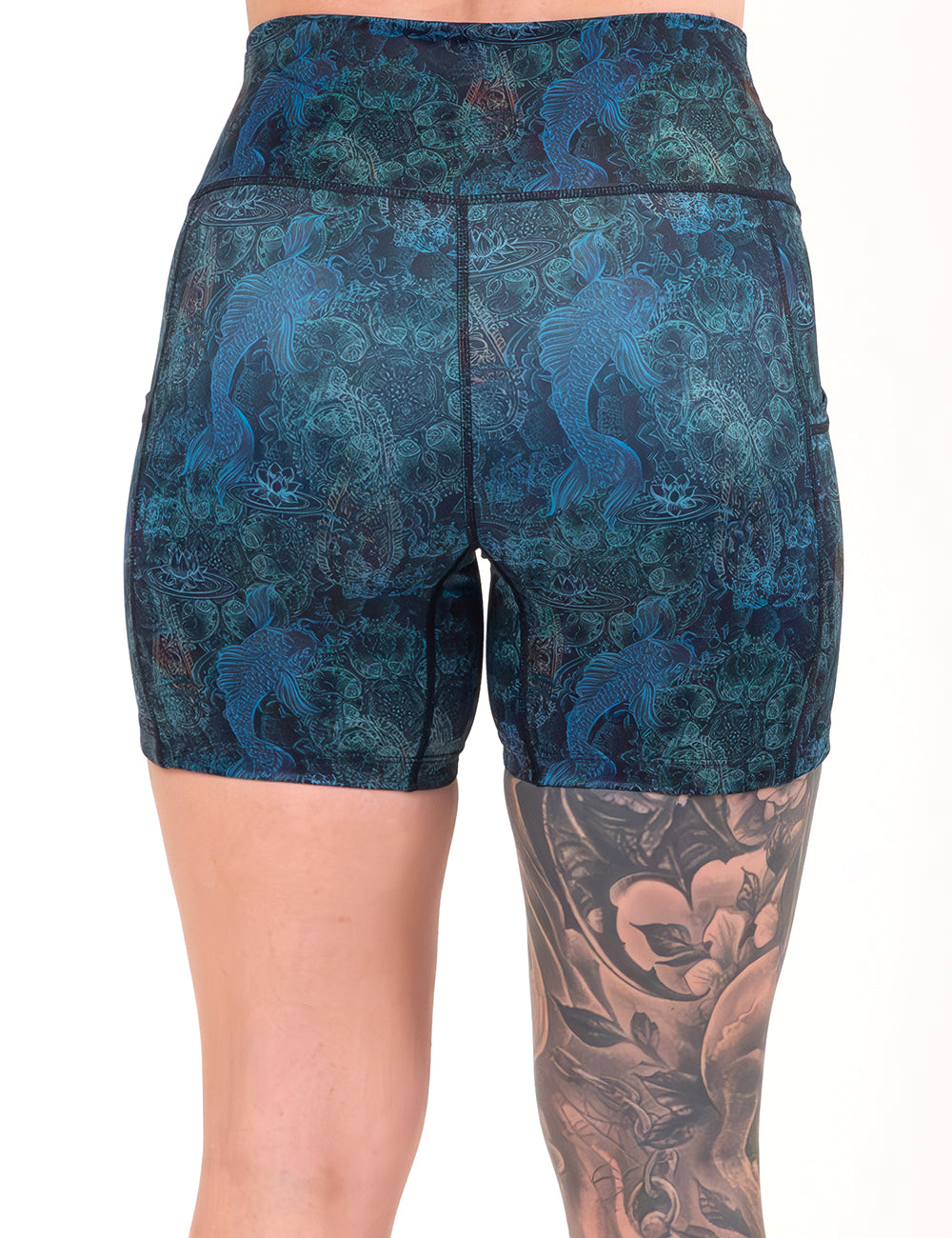 back of the 5 inch stenciled koi pattern against a blue background shorts against a white background