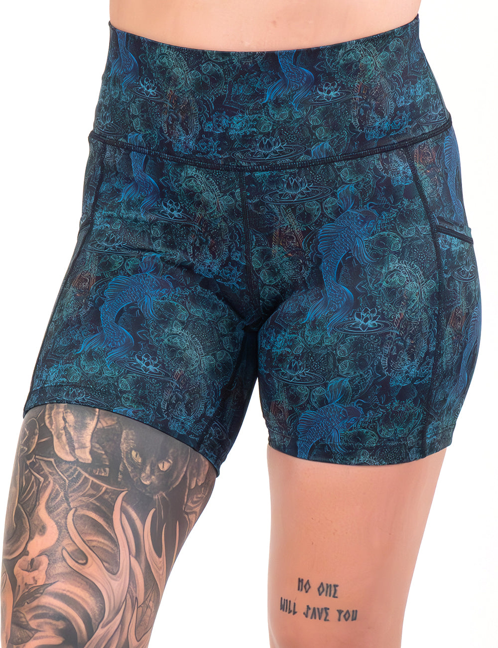 front of the 5 inch stenciled koi pattern against a blue background shorts against a white background