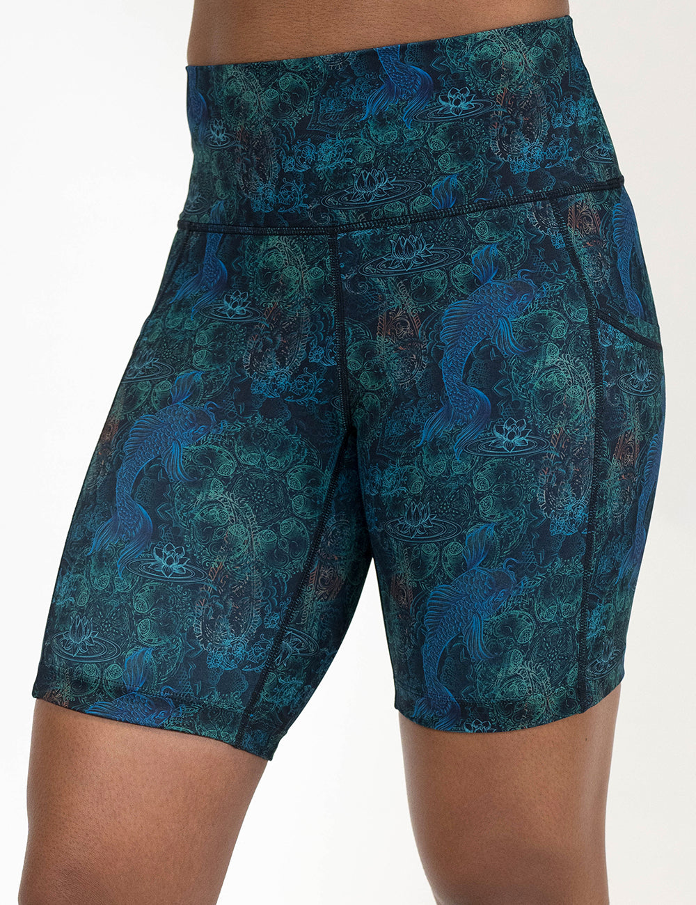 front of the 7 inch stenciled koi pattern against a blue background shorts against a white background