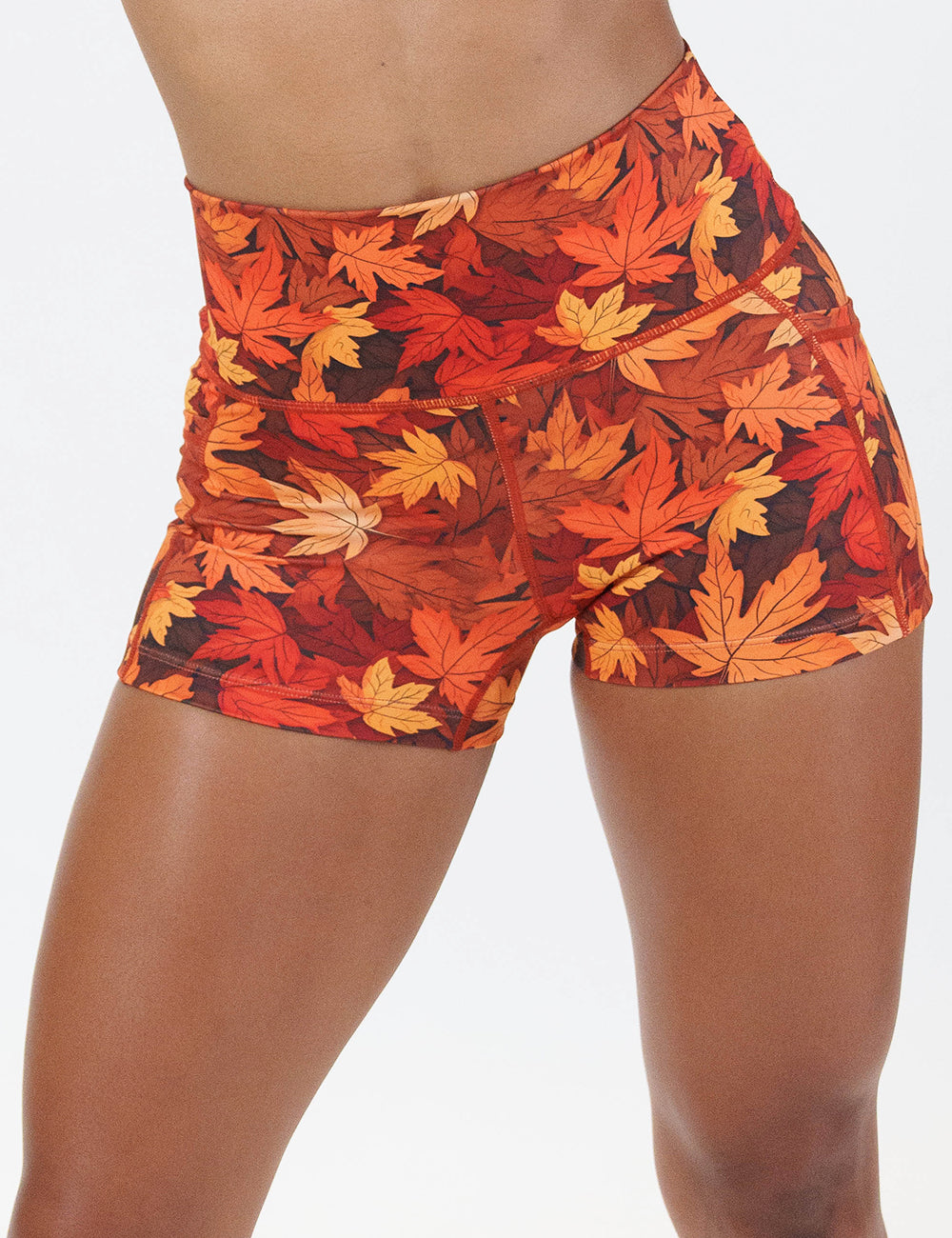 front of the 2.5 inch orange leaves shorts against a white background