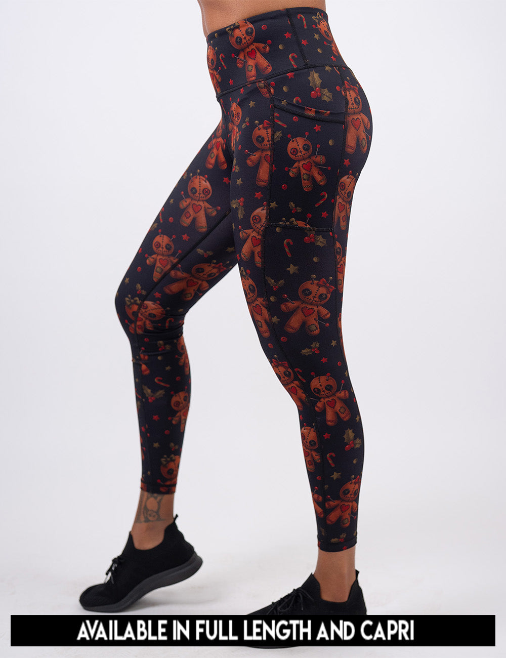 available lengths for the gingerbread voodoo dolls with pins in them surrounded by berries and stars on a black background leggings, lengths include full length and capri