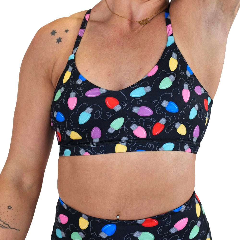 Christmas lights patterned sports bra