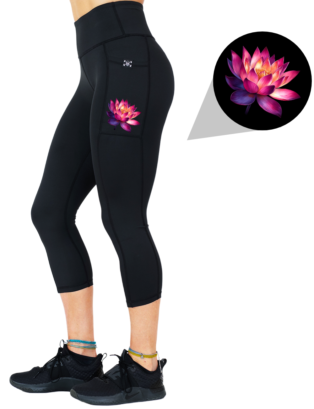 model wearing the lotus graphic capri solid black leggings against a white background