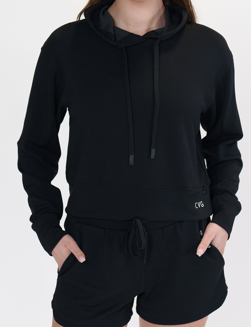 front of the black drawstring hoodie against a white background