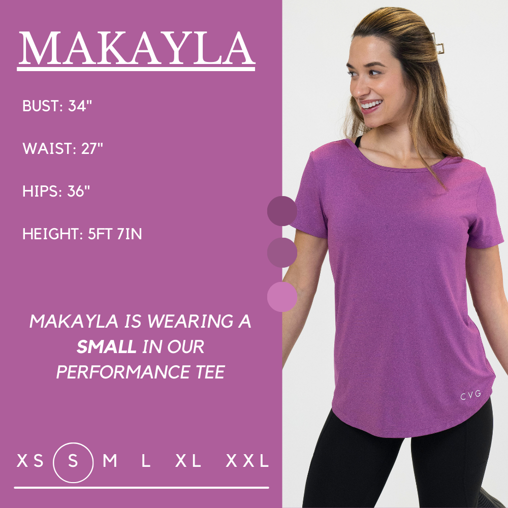 Model’s measurements of 34” bust, 27” waist, 36” hips and height of 5 ft 7 in. She is wearing a size small in our performance tee