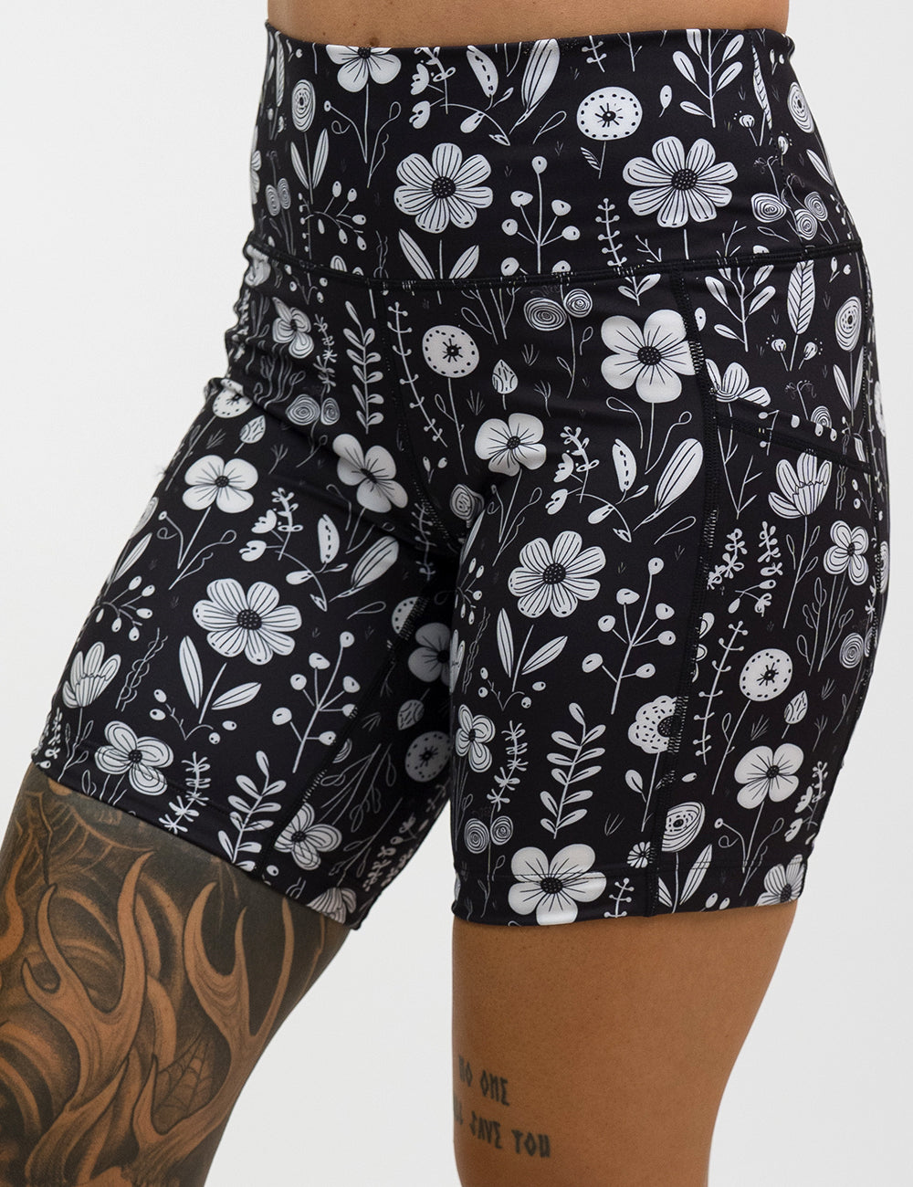 front of the 7 inch black and white floral shorts against a white background