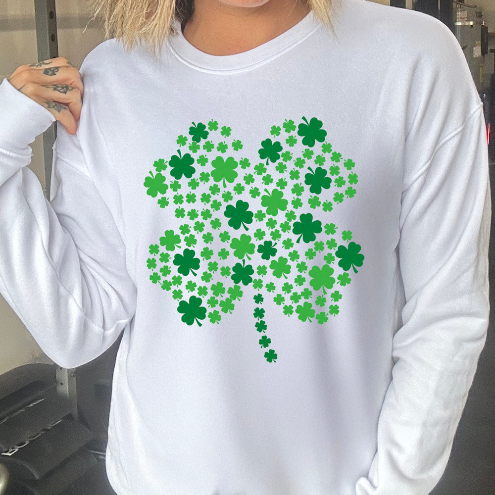 white crewneck with a shamrock graphic on it