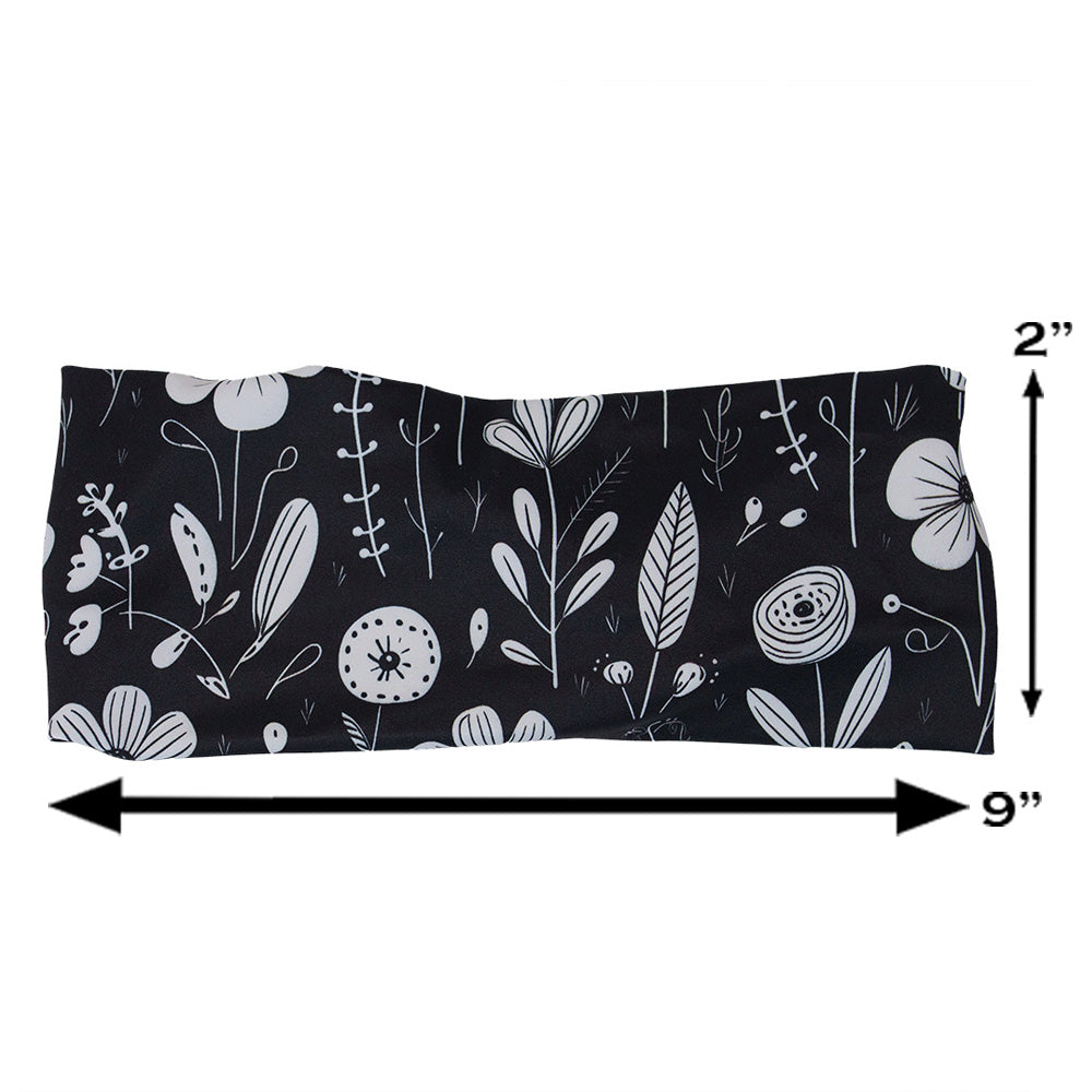 black and white floral headband measured at 2 by 9 inches
