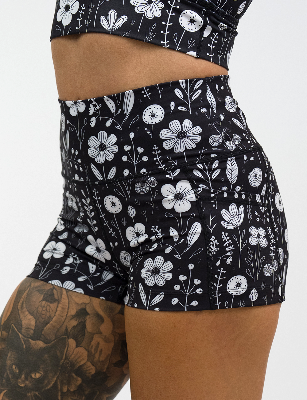 close up of 2.5 inch black and white floral shorts