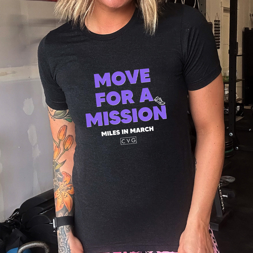 black shirt with the text "move for a mission" on it in purple