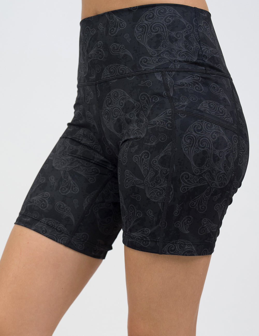 front of the 7 inch dark skull pattern shorts against a white back