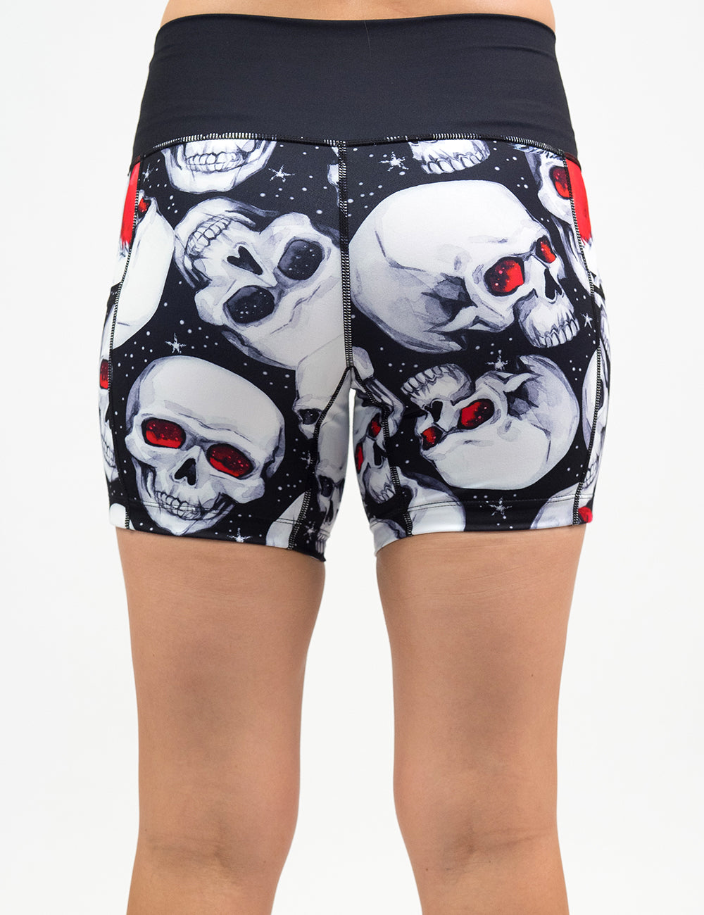 back of the 5 inch santa hat and skull pattern shorts against a white background