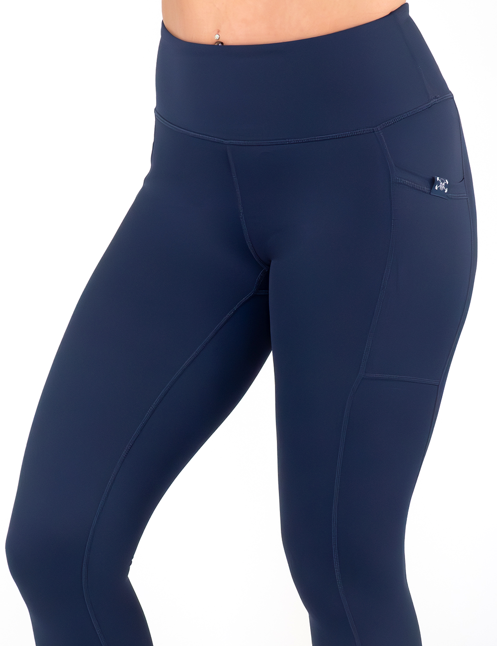 front of the solid navy blue leggings against a white background
