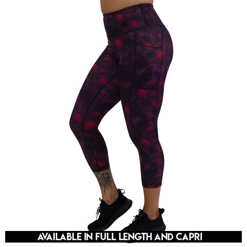 Black leggings with red floral and crow pattern on it available in full and capri length