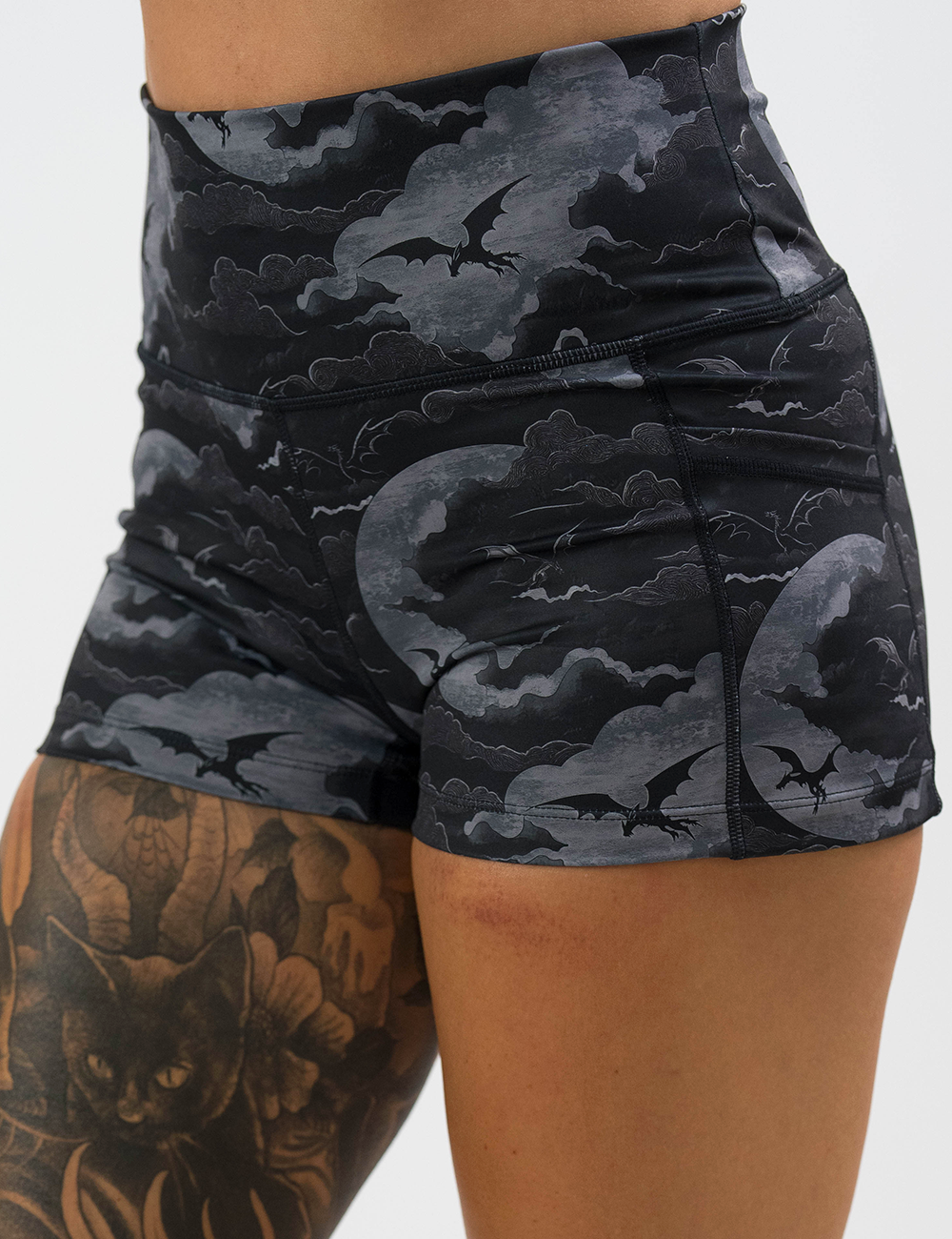 dark dragon against moonlit clouds pattern 2.5 inch shorts against a white background