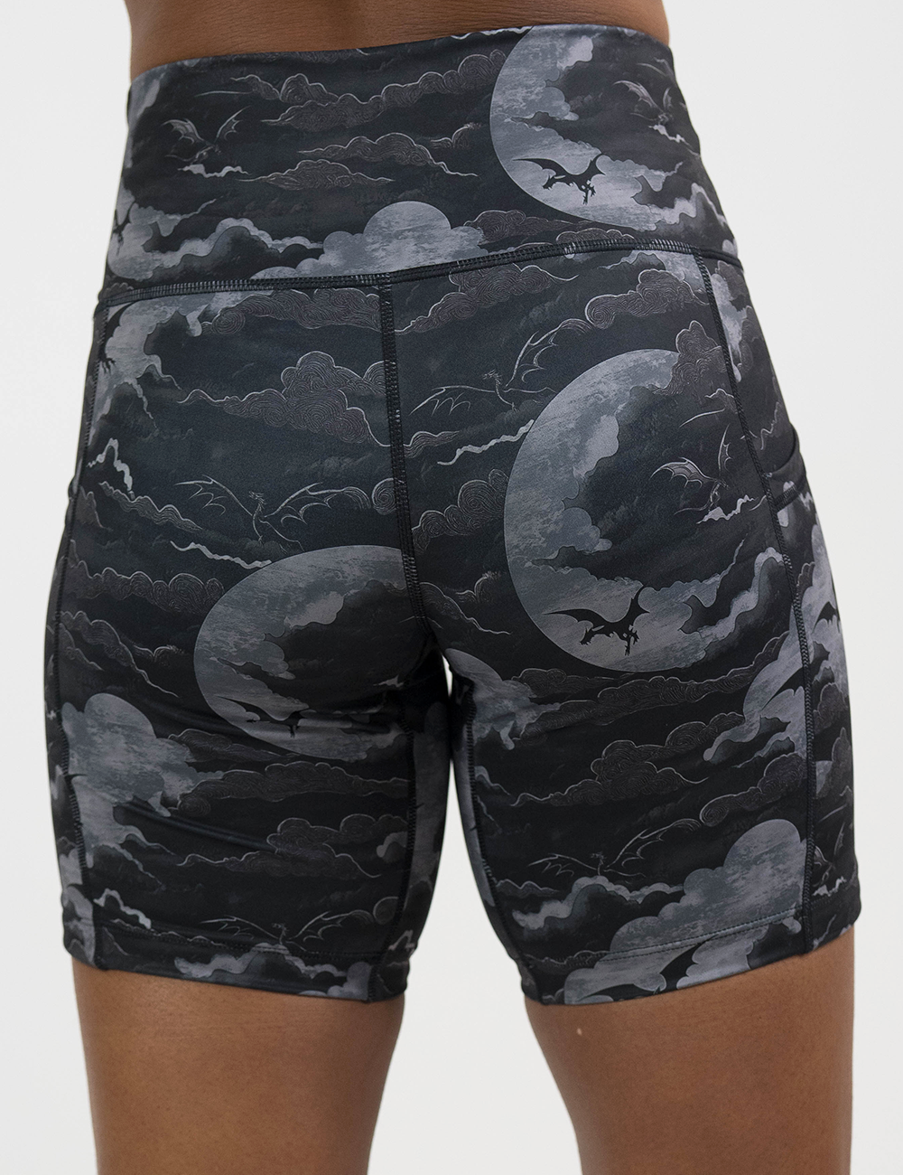 back of the 7 inch dark dragon against moonlit clouds pattern shorts against a white background