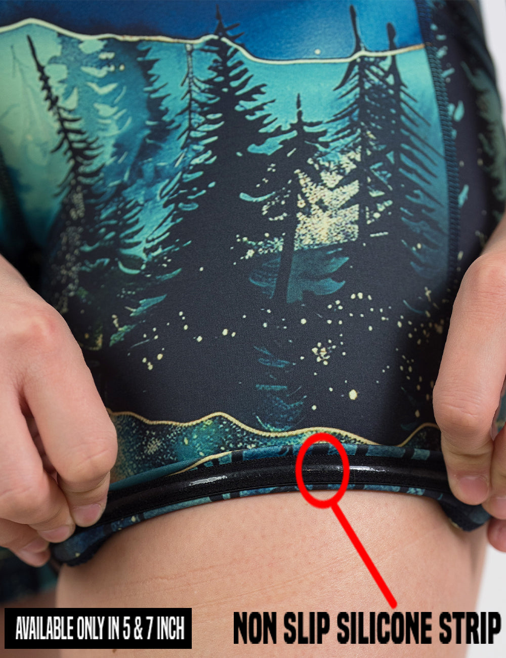 close up of the aurora forest shorts being rolled up to show the non slip silicone strip found in the 5 and 7 inch shorts