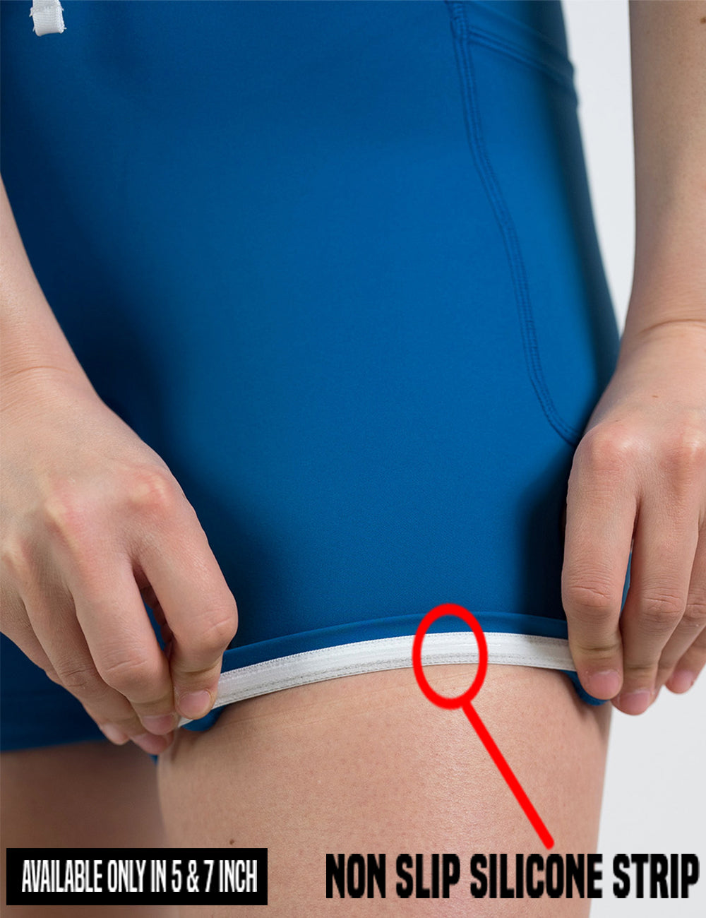 close up of the blue omni style shorts being rolled up to show the non stick silicone strip found in the 5 and 7 inch inseam sizes