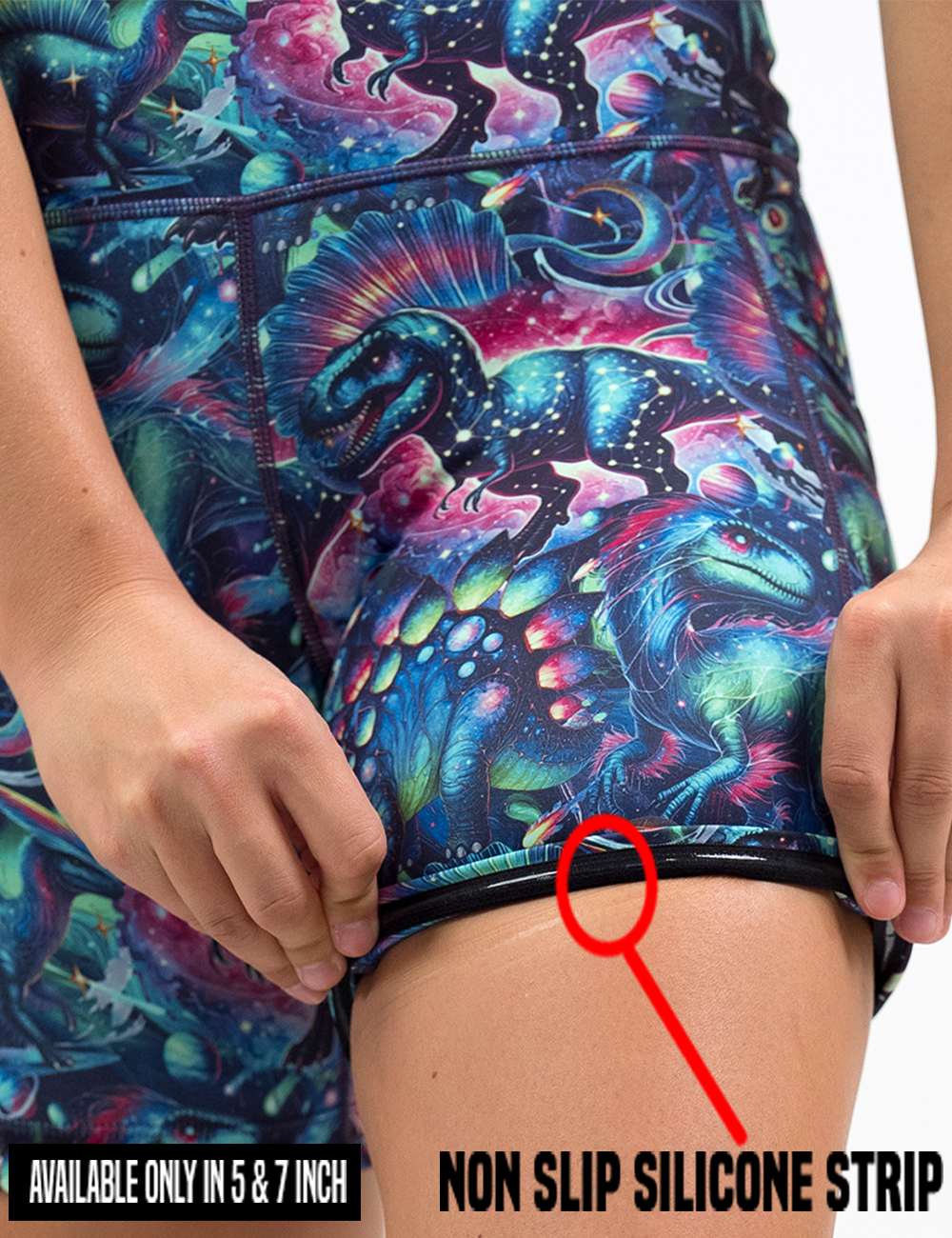 close up of the colorful dinosaur shorts rolled up to show the non slip silicone strip lining found in only the 5 and 7 inch inseam lengths