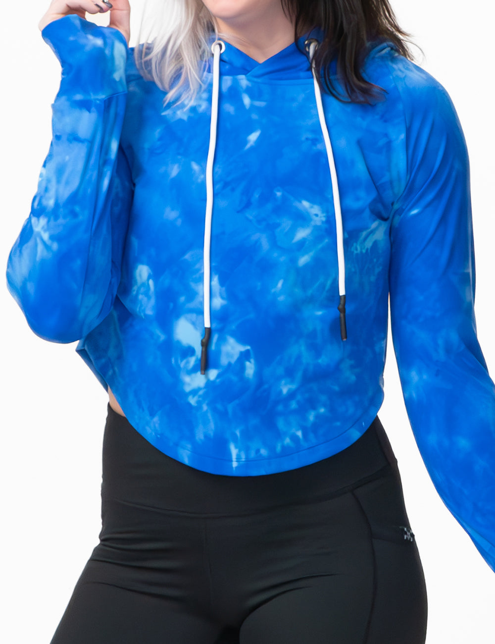 model wearing the blue and white tie dye cropped hoodie