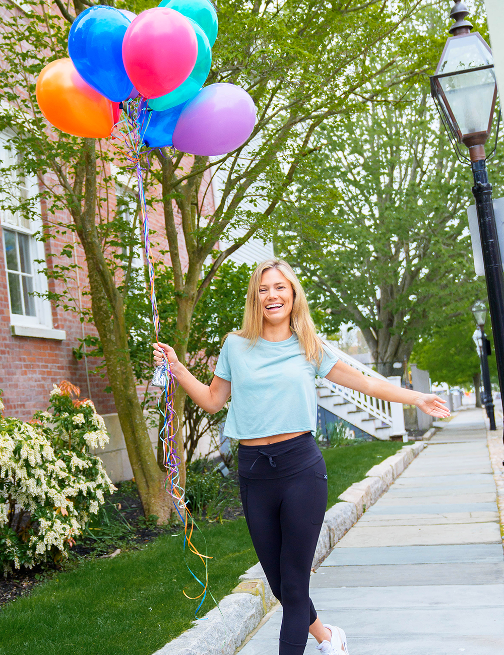 model going for a walk with the black omni leggings