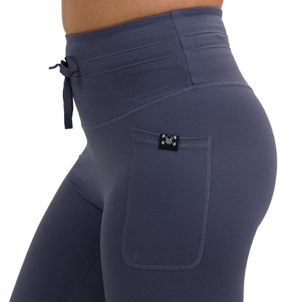 close up of the omni twilight purple leggings against a white background