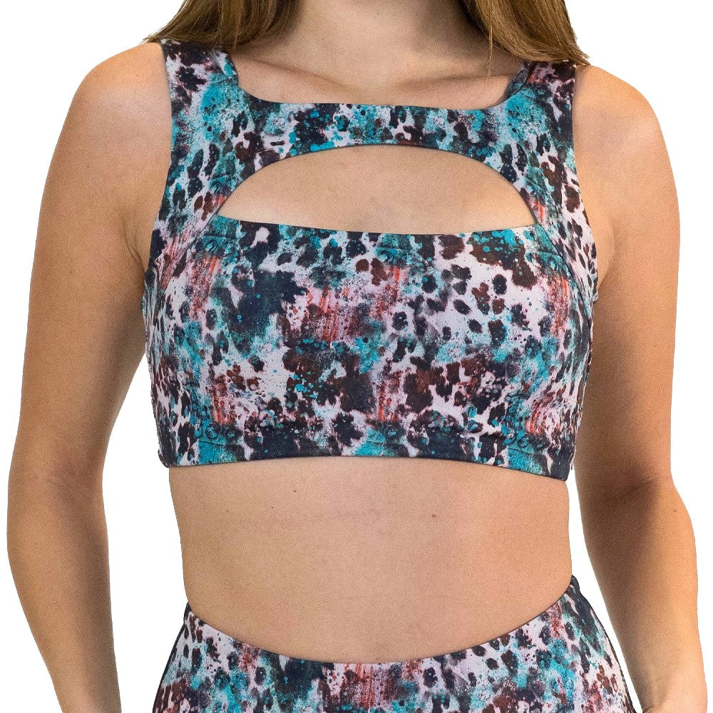leopard print with teal paint splatter sports bra