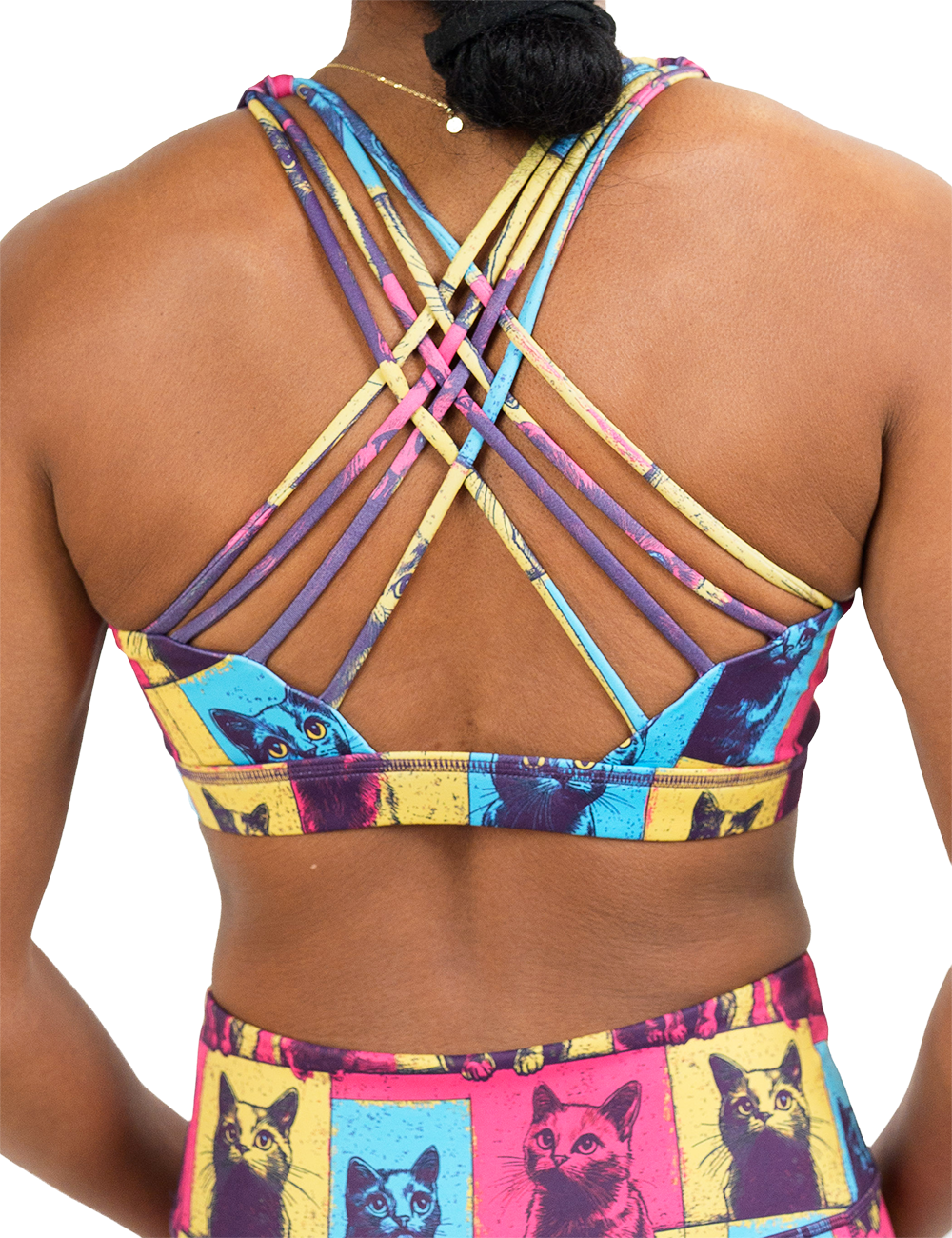 back of the red, blue, and yellow cat patchwork print butterfly back bra against a white background