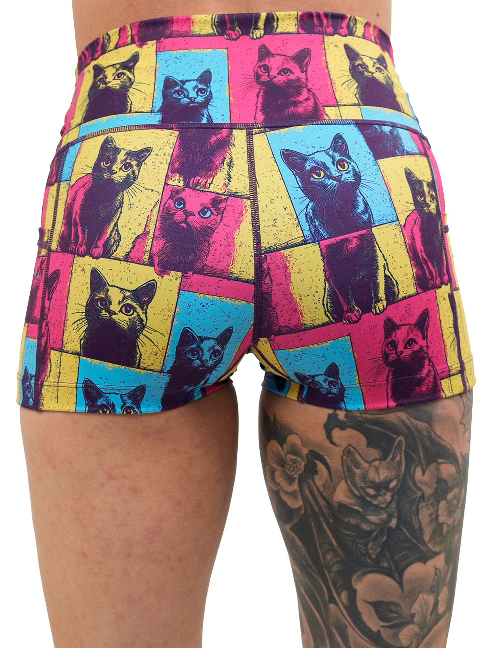 back of the red, blue, and yellow patchwork cat print 2.5 inch shorts against a white background