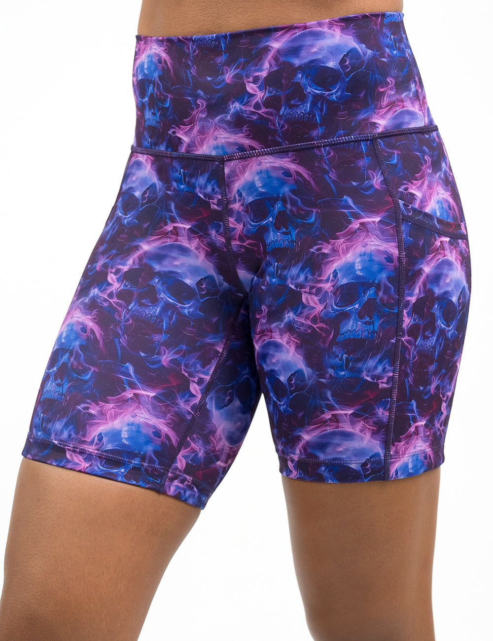 front of the 7 inch dark purple skulls on fire shorts against a white background