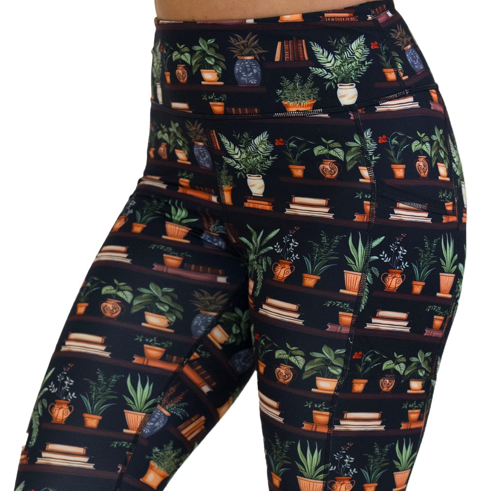 floral patterned leggings with books design on it