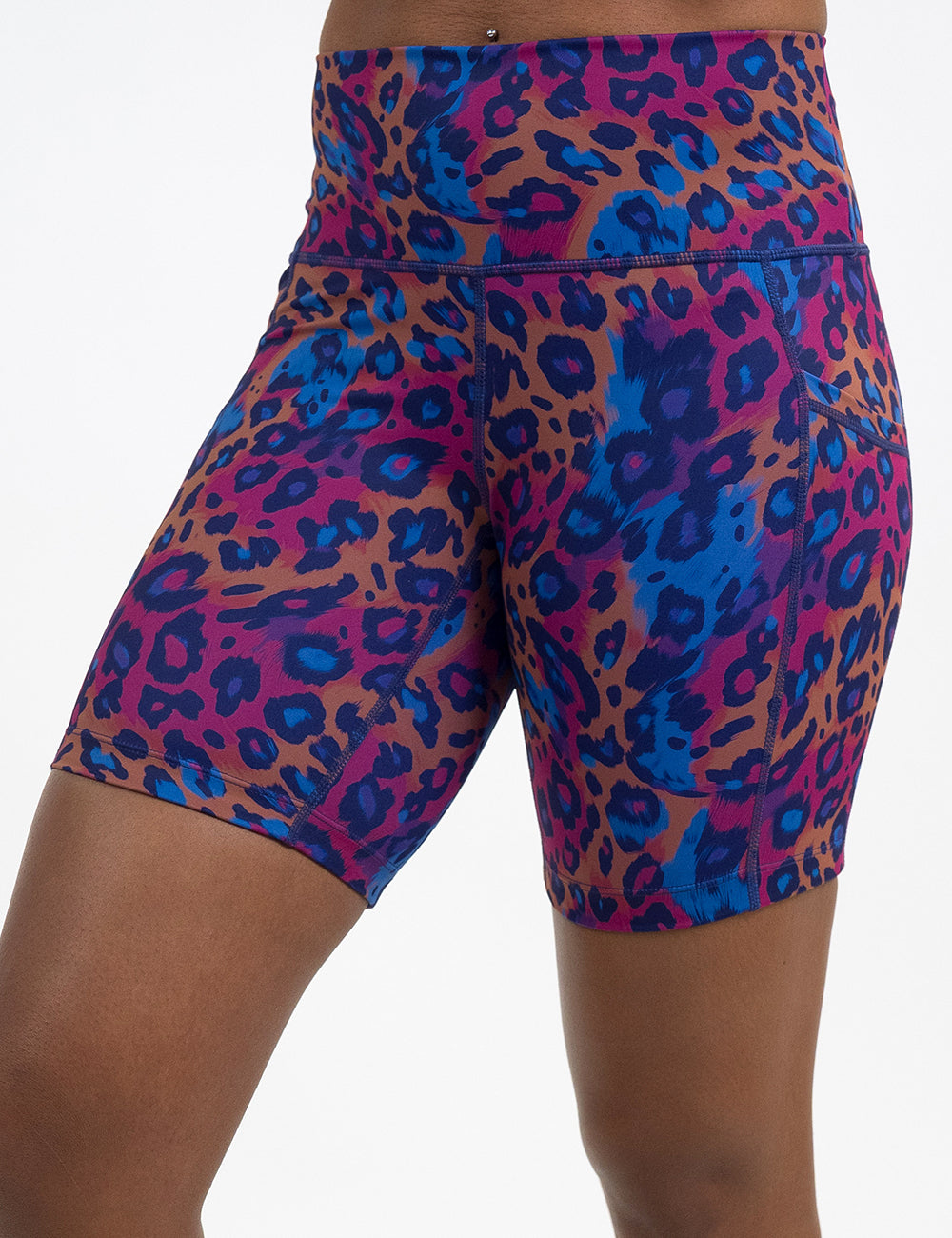 front of the 7 inch yellow, red, and blue leopard print shorts against a white background