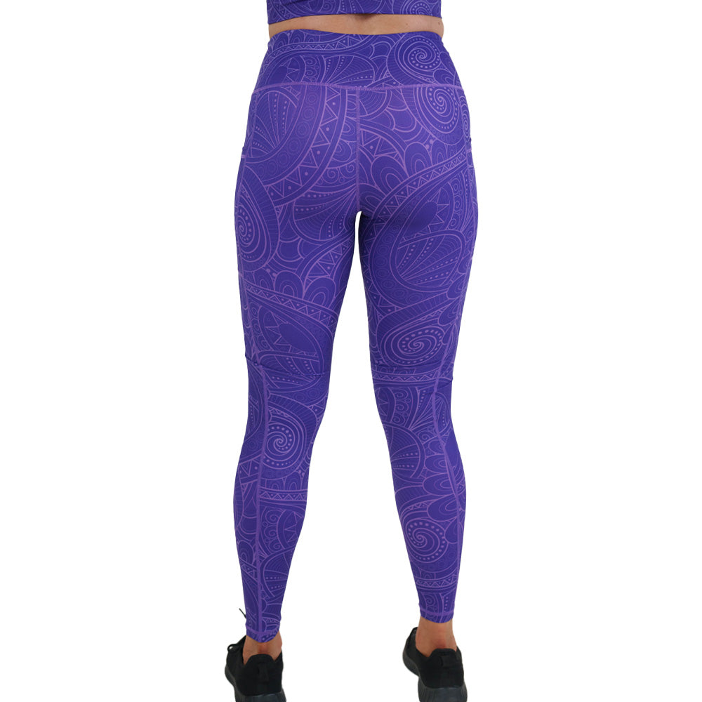back of the purple leggings with a spiral design
